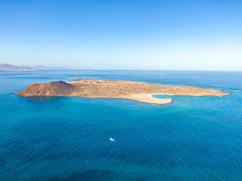 Drone view of isla de lobos, a small island off the coast of fuerteventura, canary islands, spain.