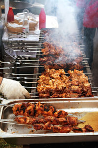 Close-up of meat on barbecue grill