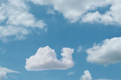 Cloud shape is helicopter on blue sky background.