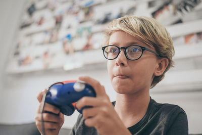 Portrait of boy wearing eyeglasses