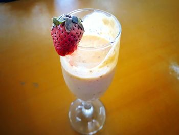 High angle view of drink in glass on table