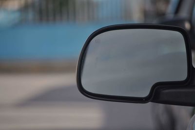 Close-up of car on street