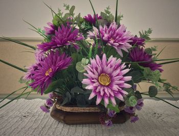 Close-up of pink flowers on table