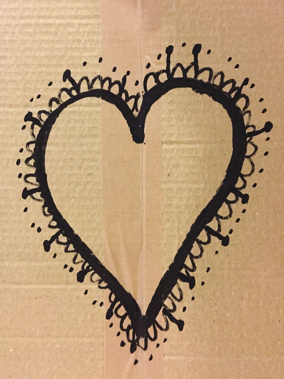 CLOSE-UP OF HEART SHAPE ON PAPER WITH TEXT