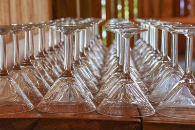 Close-up of martini glasses arranged on table