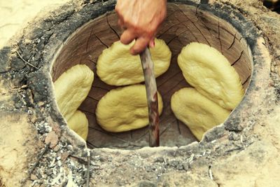 High angle view of man preparing food