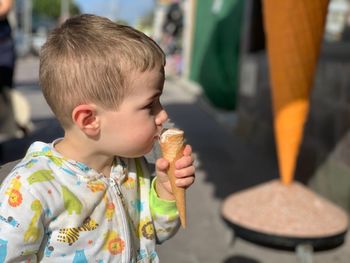 Boy holding ice cream