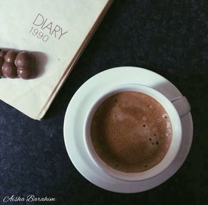 Close-up of coffee cup on table