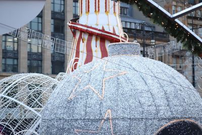 Tilt image of building in city during winter