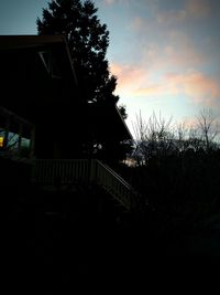 Built structure against sky at sunset