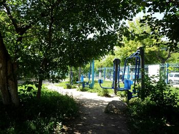 Playground in park against sky