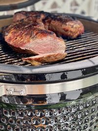 Close-up of meat on barbecue grill