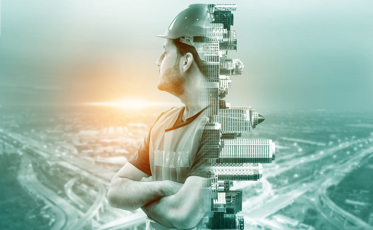 DIGITAL COMPOSITE IMAGE OF MAN AND CITYSCAPE AGAINST SKY