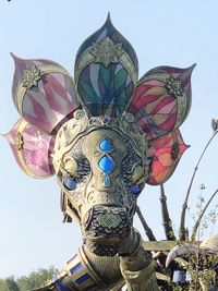 Low angle view of sculpture against clear sky