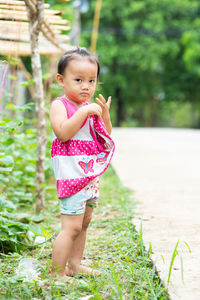 Full length portrait of cute girl