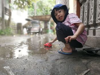 Boy playing in water