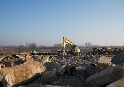 Panoramic view of construction site against sky in city