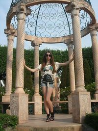 Woman standing in front of tree