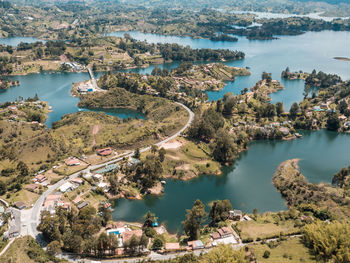 High angle view of townscape by sea