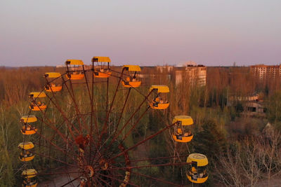 Ferris wheel in the city of pripyat at sunset time. apocalyptic city of pripyat 