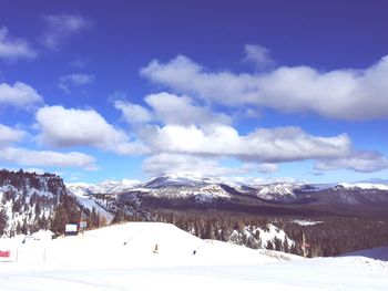 Scenic view of snow covered mountains