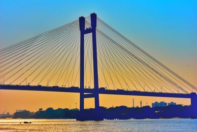 View of suspension bridge against sky- second hooghly bridge