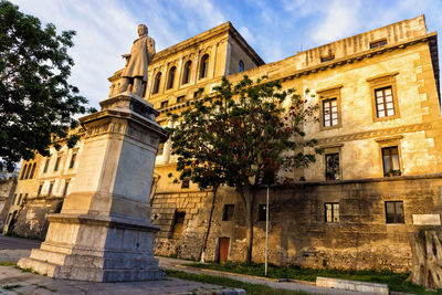 Low angle view of historical building against sky