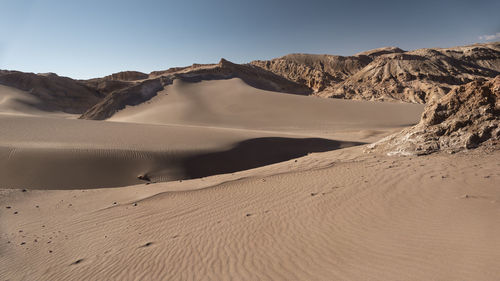 Scenic view of desert against sky