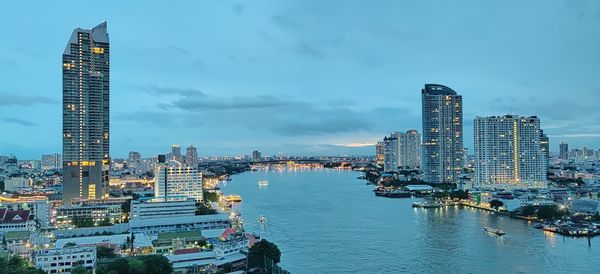 Buildings in city against sky