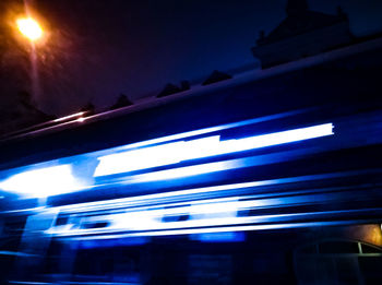 Low angle view of illuminated building at night