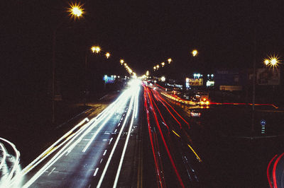 High angle view of light trails on street at night