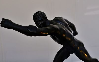 Low angle view of statue against sky