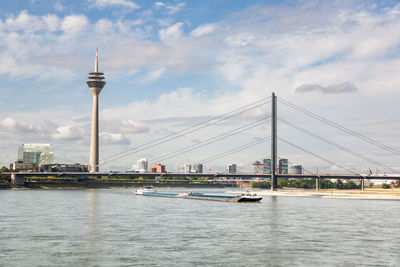 View of bridge over river in city