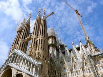 Low angle view of traditional building against sky, temple expiatori de la sagrada familia