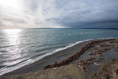 High angle landscape of beach, ocean and clouds at fort casey state park in coupeville, washington