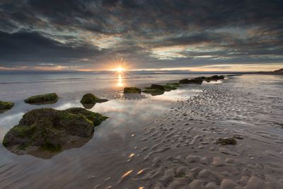 Scenic view of sunset over sea