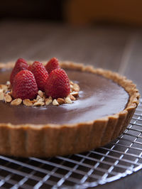 Chocolate tart on cooling rack