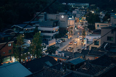High angle view of illuminated buildings in city