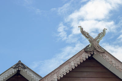 Low angle view of statue of building against sky