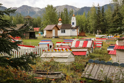 High angle view of trees and houses against sky