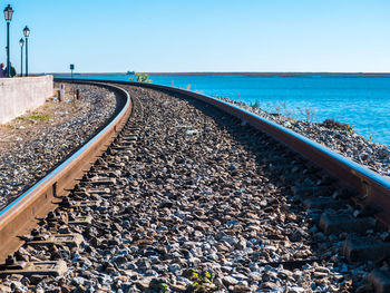 View of railroad tracks against clear sky