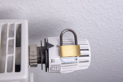 Close-up of padlock on wall