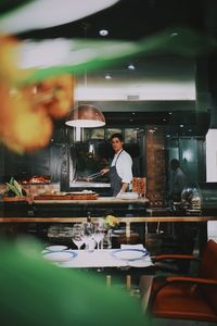 Portrait of chef preparing food in restaurant