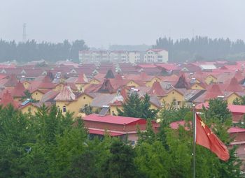 Scenic view of residential district against clear sky