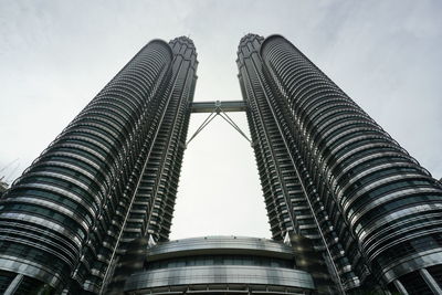 Low angle view of skyscraper against sky