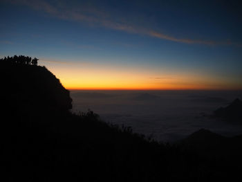 Scenic view of sea at sunset