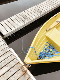 High angle view of yellow chair on table