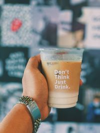 Close-up of woman hand holding drink