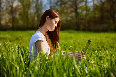 Young woman using mobile phone