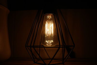 Close-up of illuminated light bulb